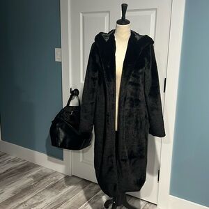 Warm black classic coat with hood. Looks like real fur but faux all the way.